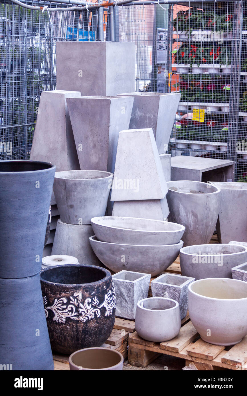 Glazed and unglazed ceramic flower pots in a variety of sizes and