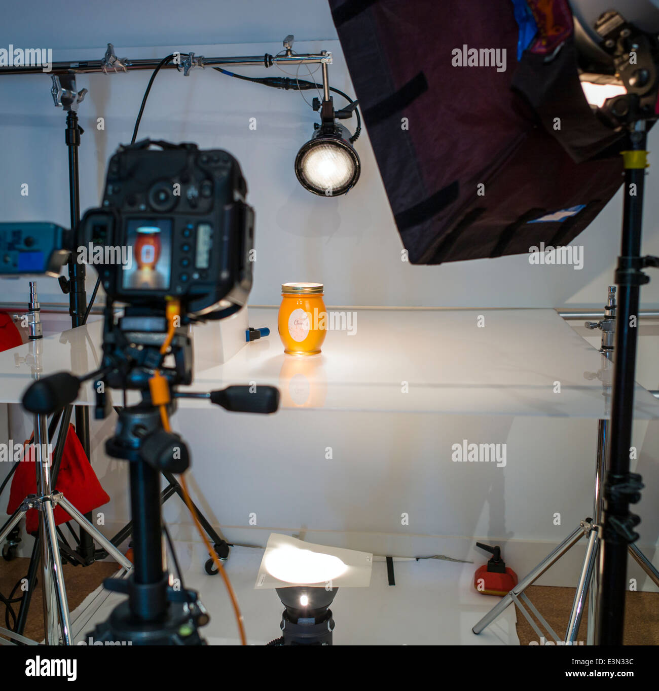 Commercial photography set, including lighting, background and grip gear. Stock Photo