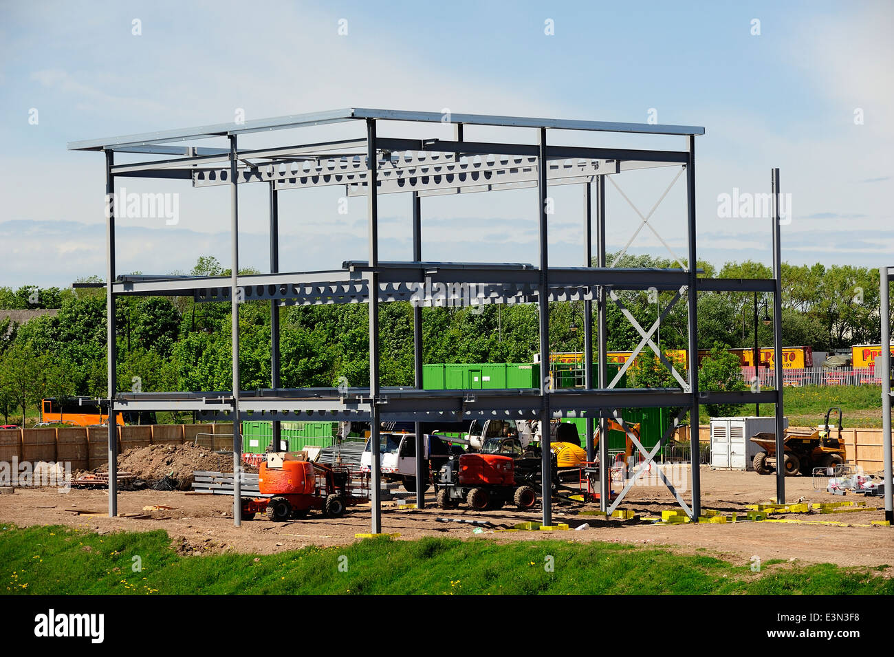 Steel frame building under construction hires stock photography and