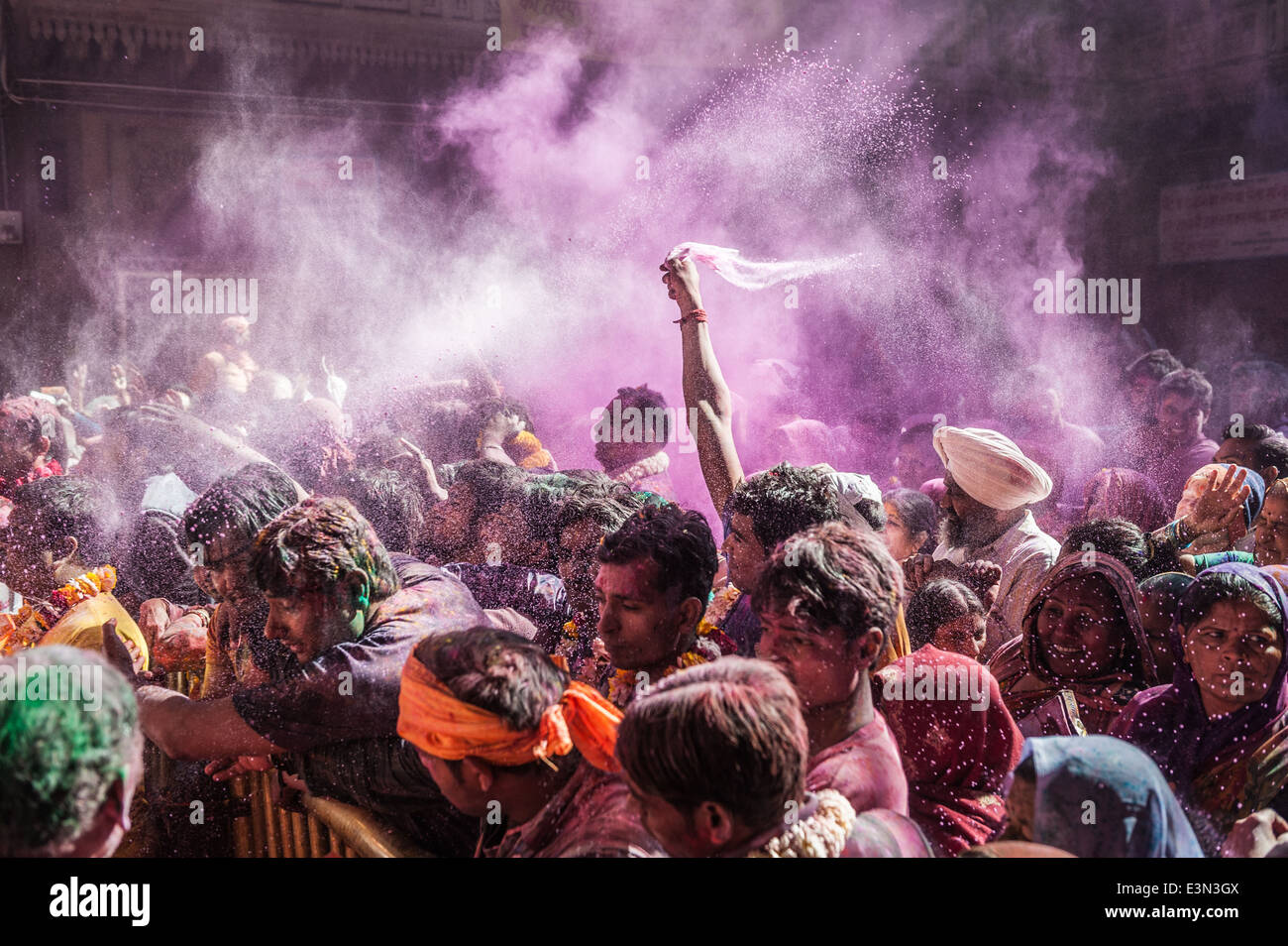 People celebrating Holi festival 2014, Vrindavan, India. Stock Photo
