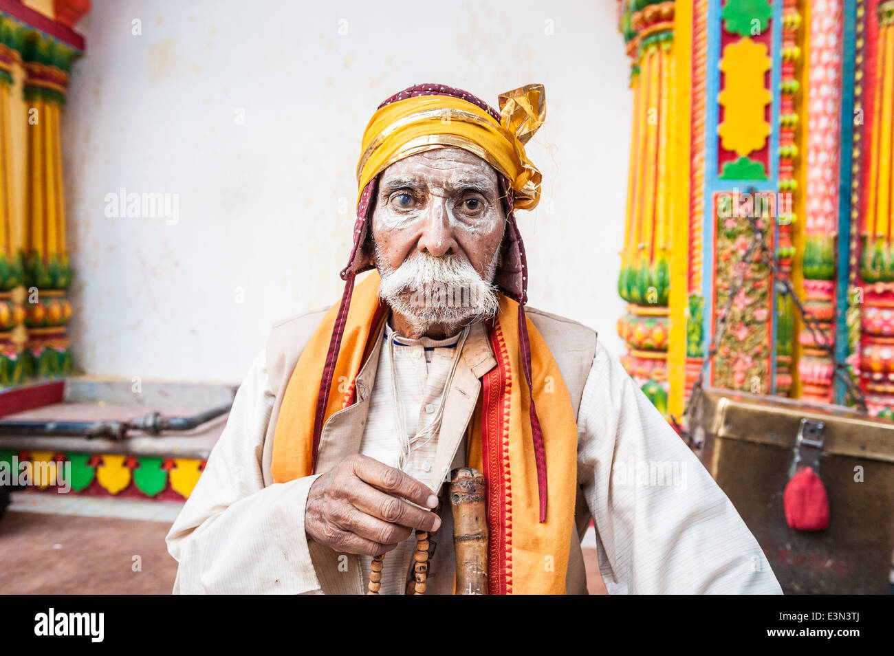 Old man in a temple during holi celebration, Mathura, India, Asia. Stock Photo