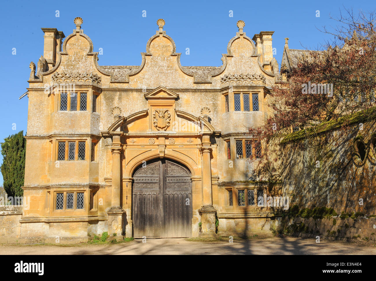 The Historic Gate House Entrance to a Manor House in the Rural Village of Stanway, in the Cotswolds, Gloucestershire, England Stock Photo