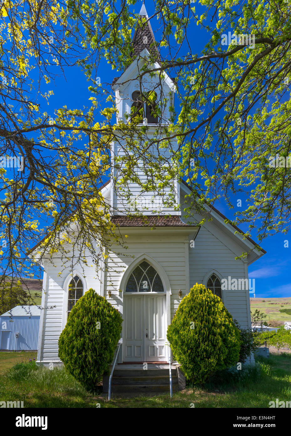 Maryhill, Washington: Maryhill Community Church, 1888, with spring trees Stock Photo