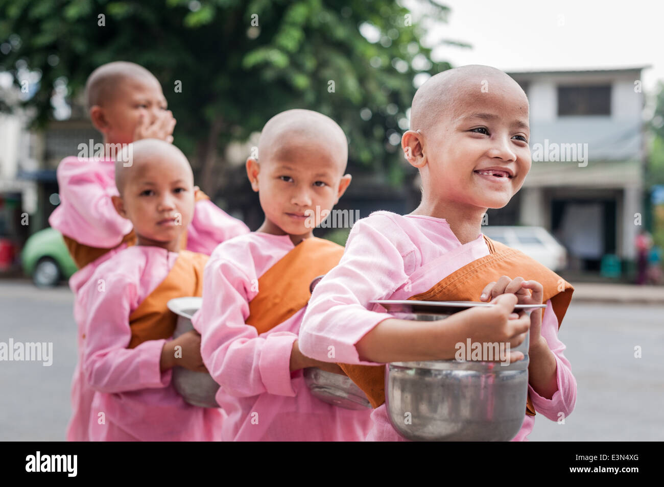 Buddhist novices in their morning walk to beg for food, Yangon, Myanmar, Asia. Stock Photo