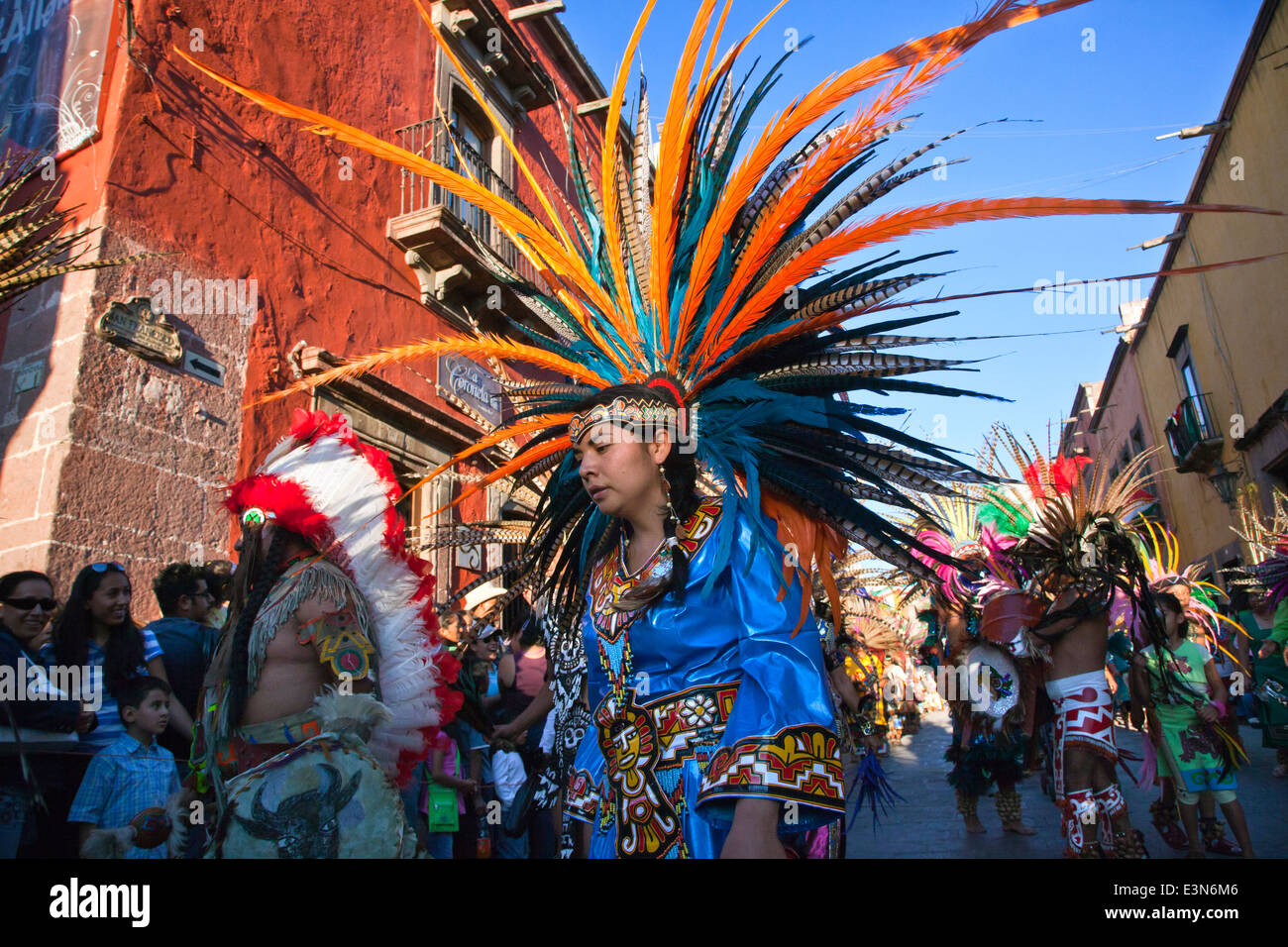 DANCE TROUPES from all over MEXICO parade through the streets of San Miguel Arcangel, the patron saint of SAN MIGUEL DE ALLENDE Stock Photo