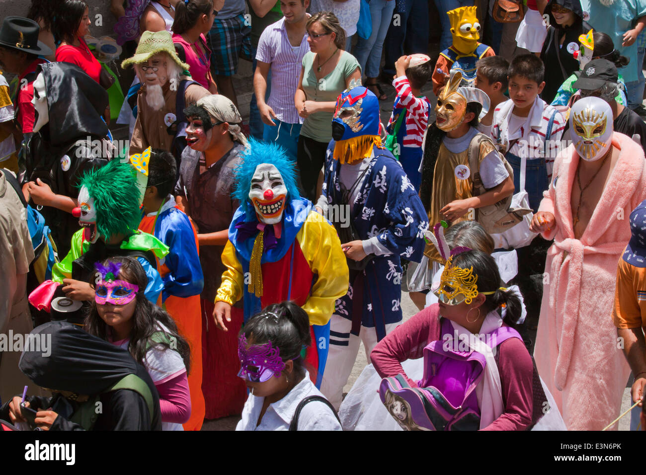 Mexicans dress in costumes and participate the DIA DE LOS LOCOS PARADE - SAN MIGUEL DE ALLENDE, GUANAJUATO, MEXICO Stock Photo