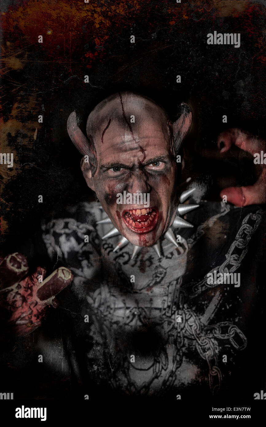 Painterly and grunge effect image of a male Zombie - Halloween event Stock Photo