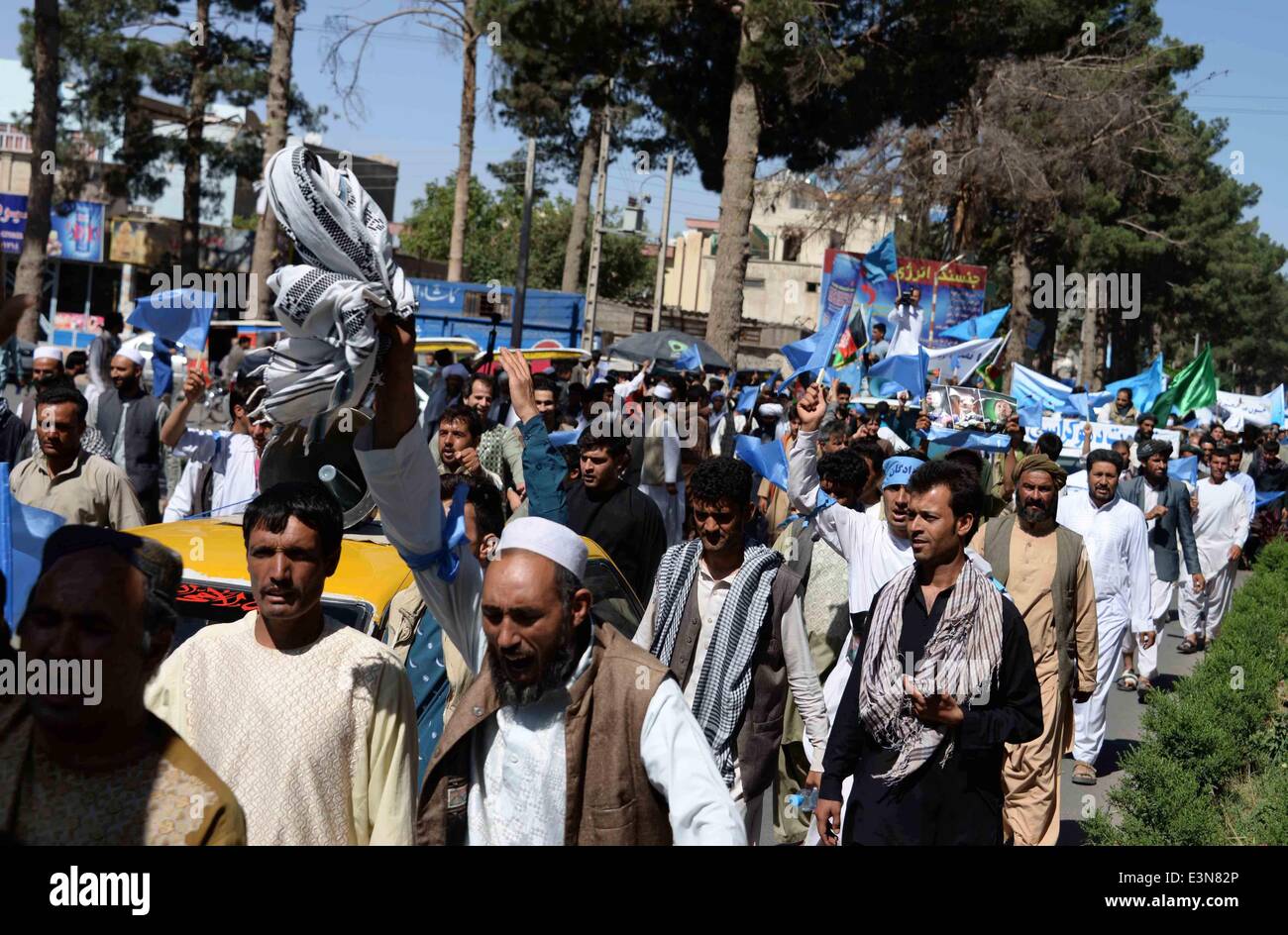 Herat. 24th June, 2014. Afghan protesters shout slogans during a protest against alleged election irregularities and fraud in Herat province in western Afghanistan on June 24, 2014. © Sardar/Xinhua/Alamy Live News Stock Photo