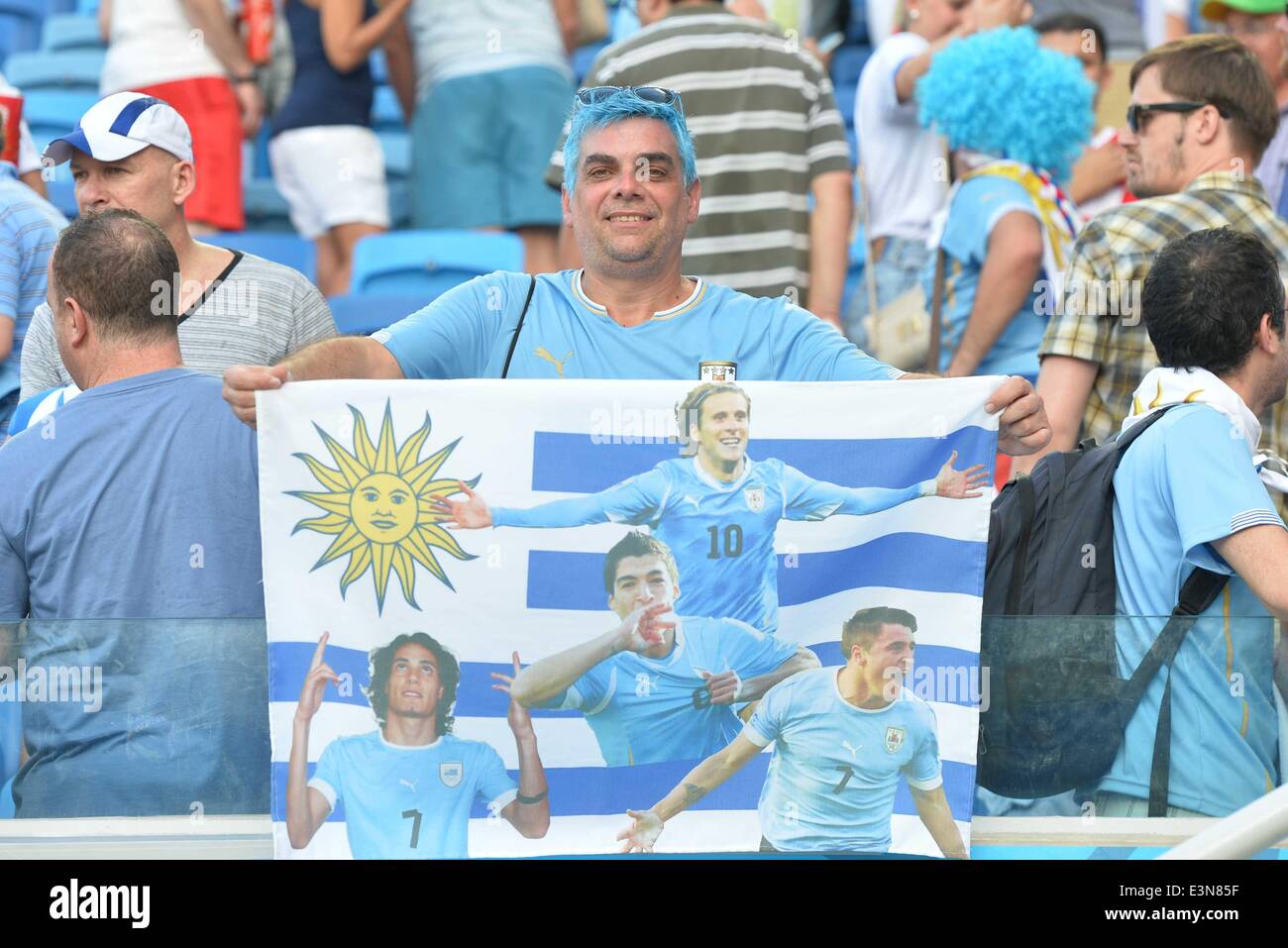 Natal, Brazil. 24th June, 2014. An Uruguay's fan celebrates the victory after a Group D match between Italy and Uruguay of 2014 FIFA World Cup at the Estadio das Dunas Stadium in Natal, Brazil, June 24, 2014. Uruguay won 1-0 over Italy on Tuesday. © Guo Yong/Xinhua/Alamy Live News Stock Photo