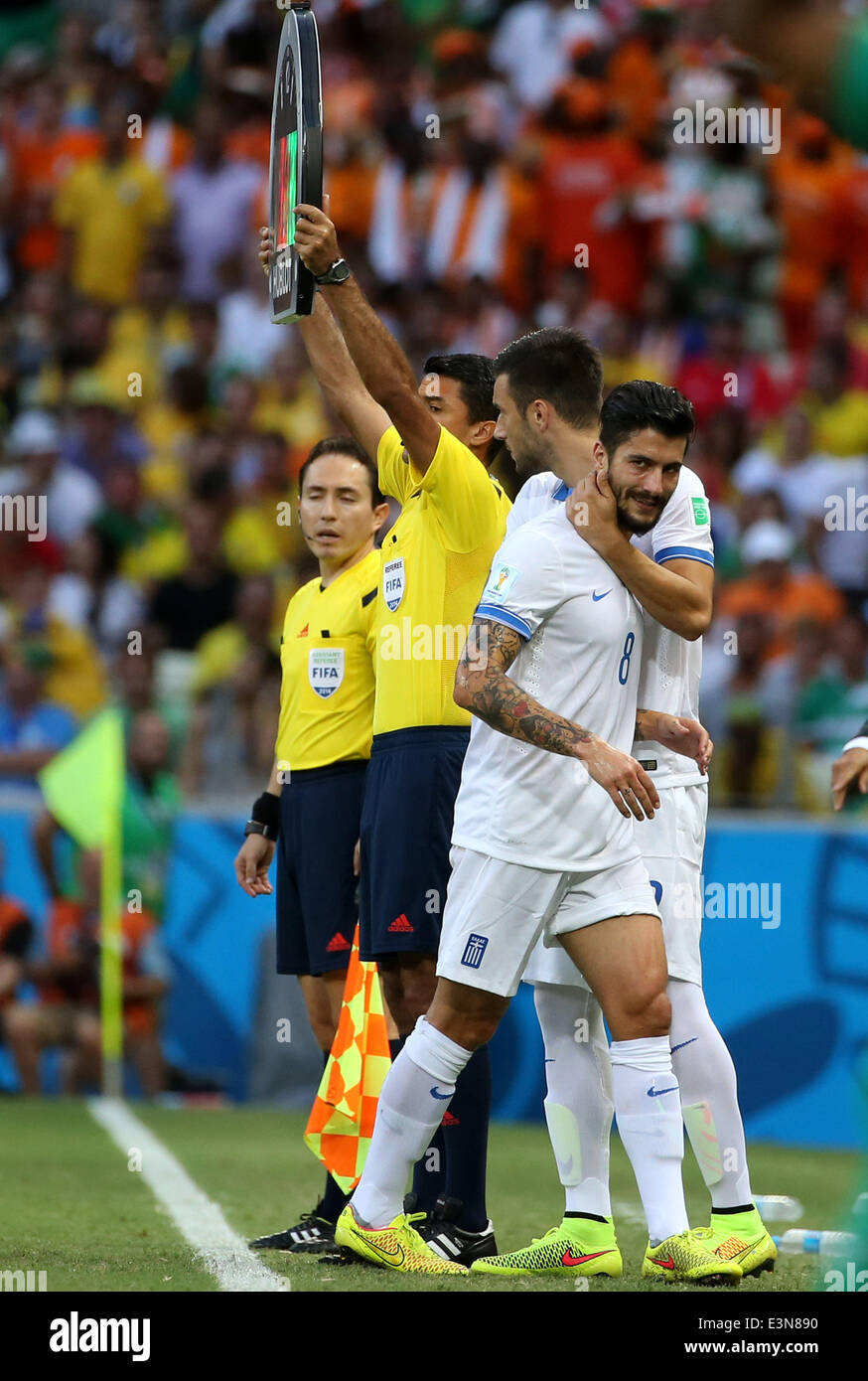 Fortaleza, Brazil. 24th June, 2014. Greece's Panagiotis Kone (front) is replaced due to injury during a Group C match between Greece and Cote d'Ivoire of 2014 FIFA World Cup at the Estadio Castelao Stadium in Fortaleza, Brazil, June 24, 2014. Credit:  Cao Can/Xinhua/Alamy Live News Stock Photo