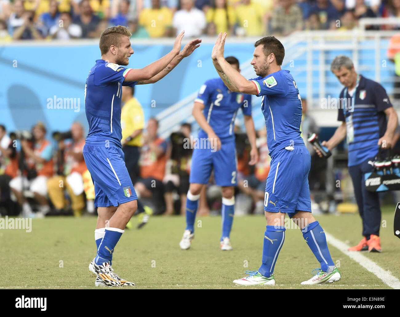 Natal, Brazil. 24th June, 2014. Italy's Antonio Cassano (R) substitutes Ciro Immobile during a Group D match between Italy and Uruguay of 2014 FIFA World Cup at the Estadio das Dunas Stadium in Natal, Brazil, June 24, 2014. Uruguay won 1-0 over Italy on Tuesday. © Lui Siu Wai/Xinhua/Alamy Live News Stock Photo