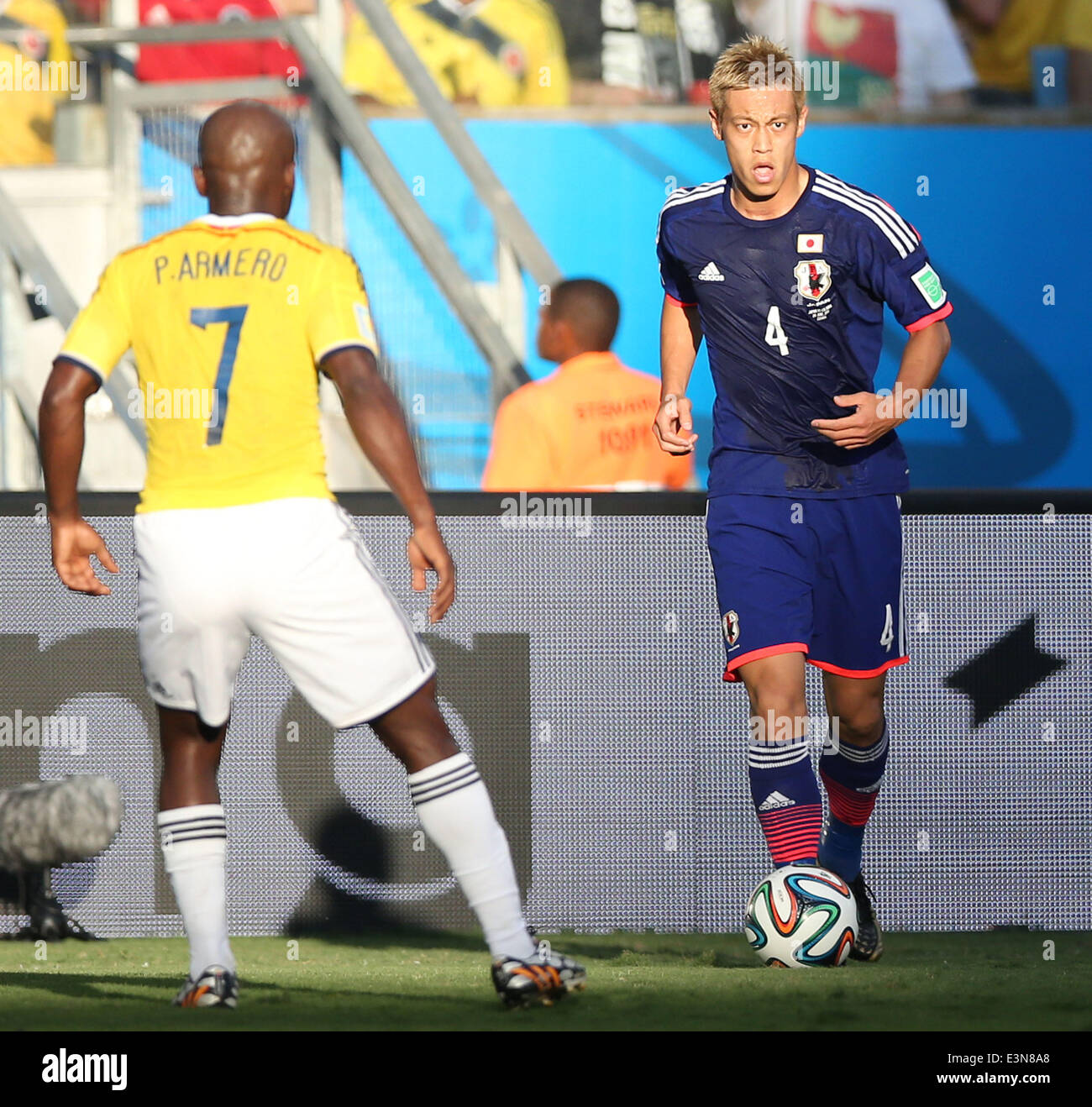 Cuiaba, Brazil. 24th June, 2014. Japan's Keisuke Honda controls the ball during a Group C match between Japan and Colombia of 2014 FIFA World Cup at the Arena Pantanal Stadium in Cuiaba, Brazil, June 24, 2014. © Li Ming/Xinhua/Alamy Live News Stock Photo