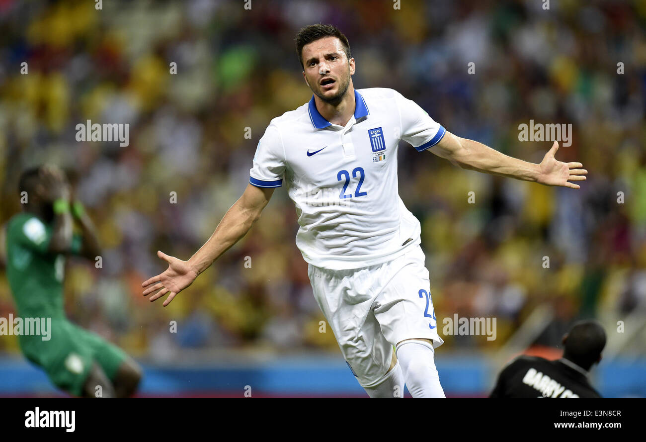 Fortaleza, Brazil. 24th June, 2014. Greece's Andreas Samaris celebrates for a goal during a Group C match between Greece and Cote d'Ivoire of 2014 FIFA World Cup at the Estadio Castelao Stadium in Fortaleza, Brazil, June 24, 2014. Credit:  Yang Lei/Xinhua/Alamy Live News Stock Photo