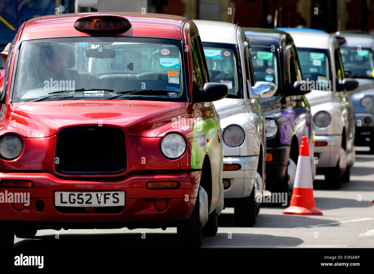 London, England, UK. Line of London taxis, black, white and red Stock Photo