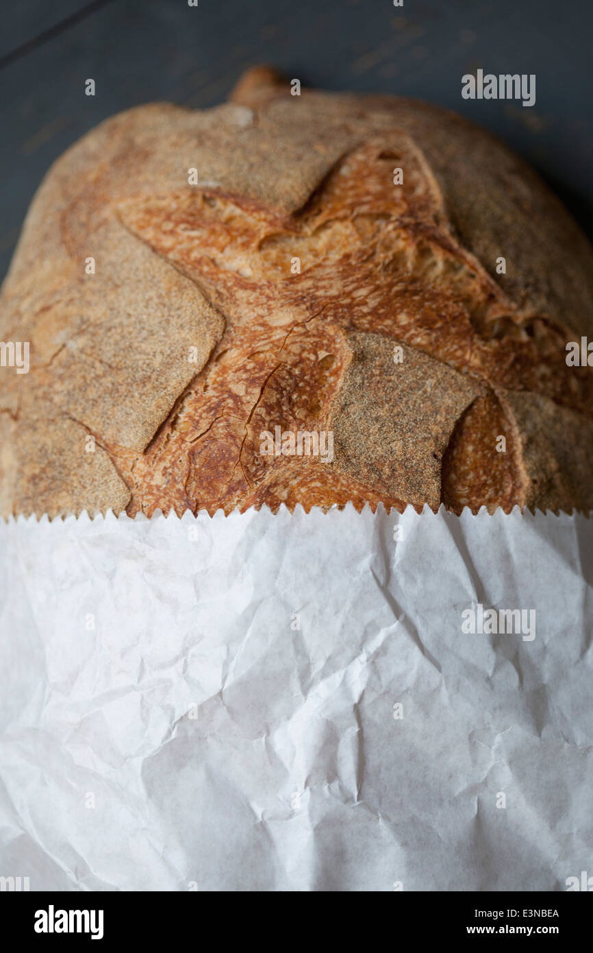 Loaf of bread in paper bag Stock Photo