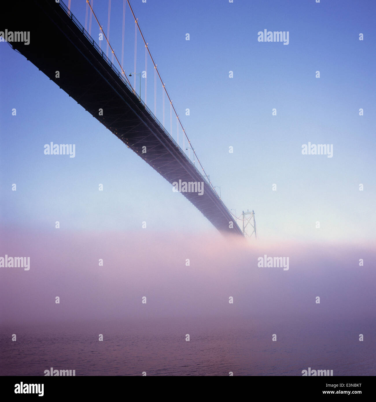 Lions Gate Bridge over sea in fog, Vancouver, Canada Stock Photo