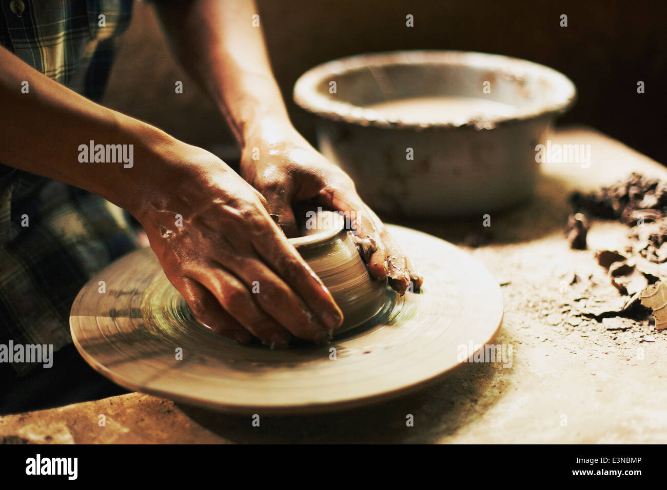 Cropped image of potter moulding clay in Stock Photo Alamy