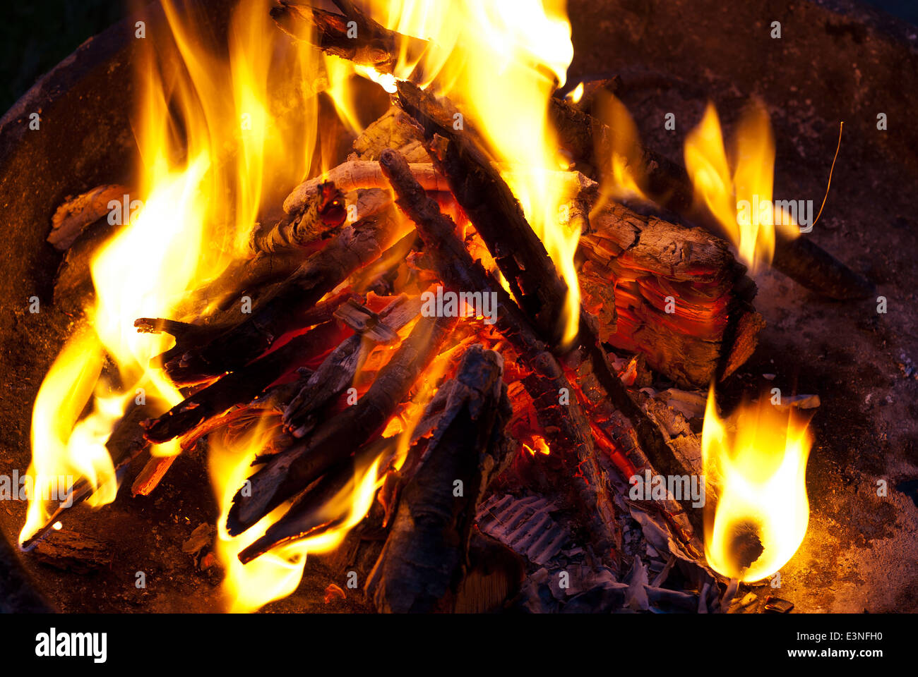 Burning wood in the fireplace and the flames Stock Photo - Alamy