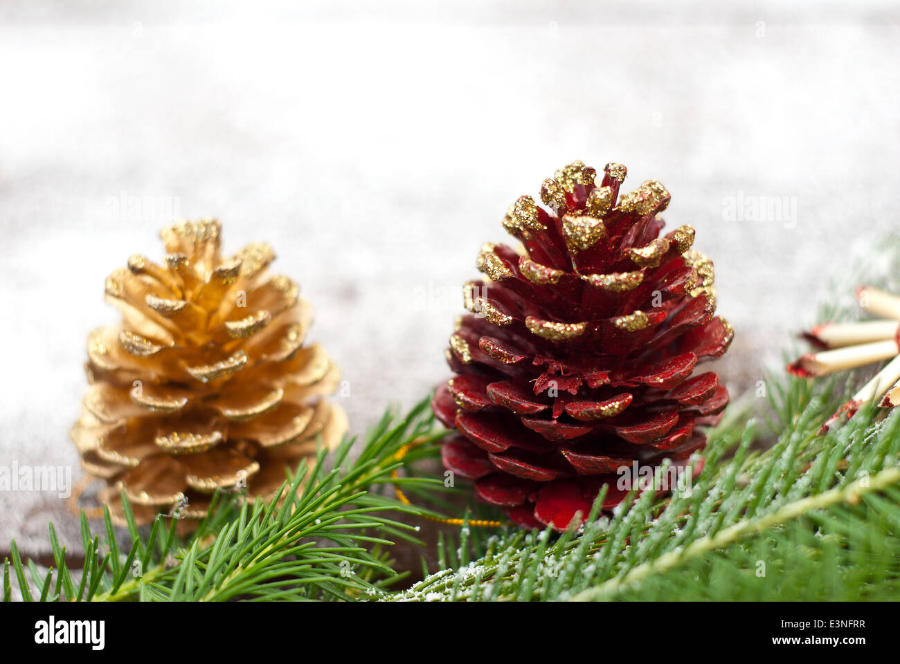 New Year holidays and Christmas green spruce branches with painted ...