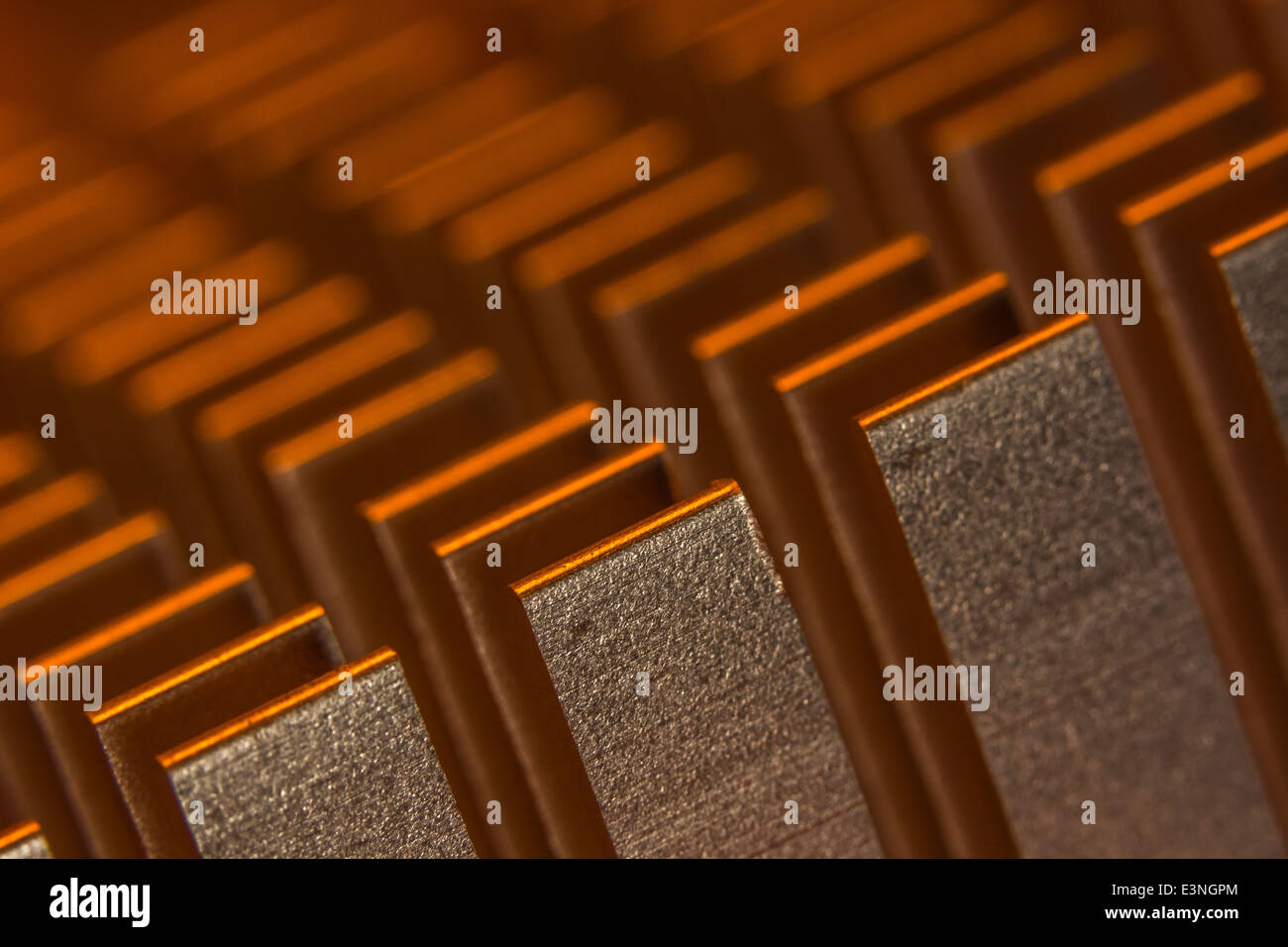 Macro-photo showing the cooling fins of a PC heat-sink used to cool motherboard chips. For focus info see 'Description' section. Stock Photo