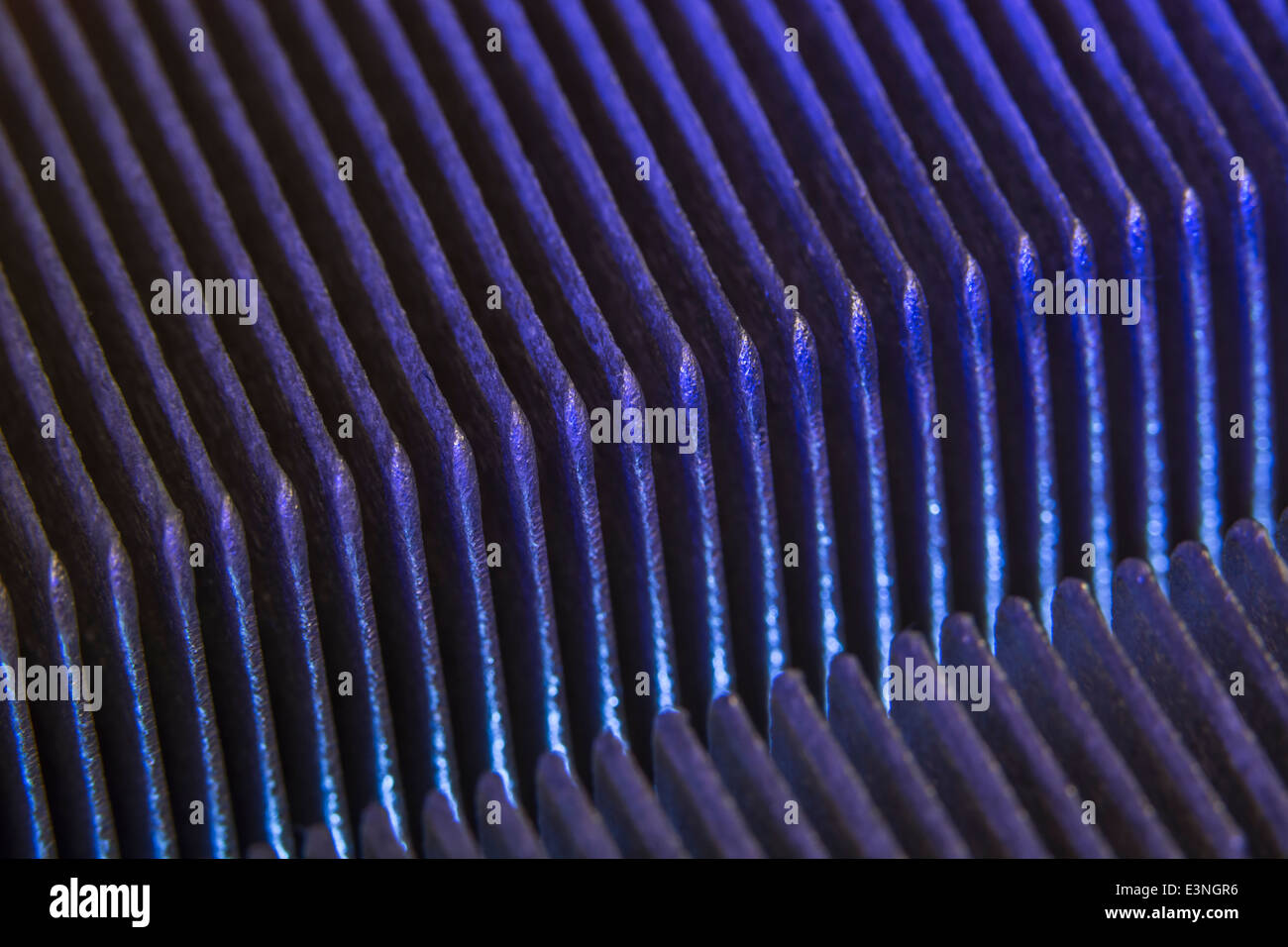 Macro-photo showing the cooling fins of a PC CPU cooling (fan) unit. For focus info see 'Description' section. Stock Photo