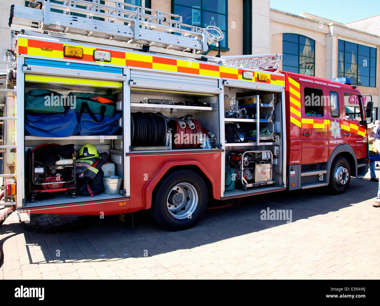 Cornwall fire and rescue fire engine with lockers open, Truro, Cornwall, UK Stock Photo