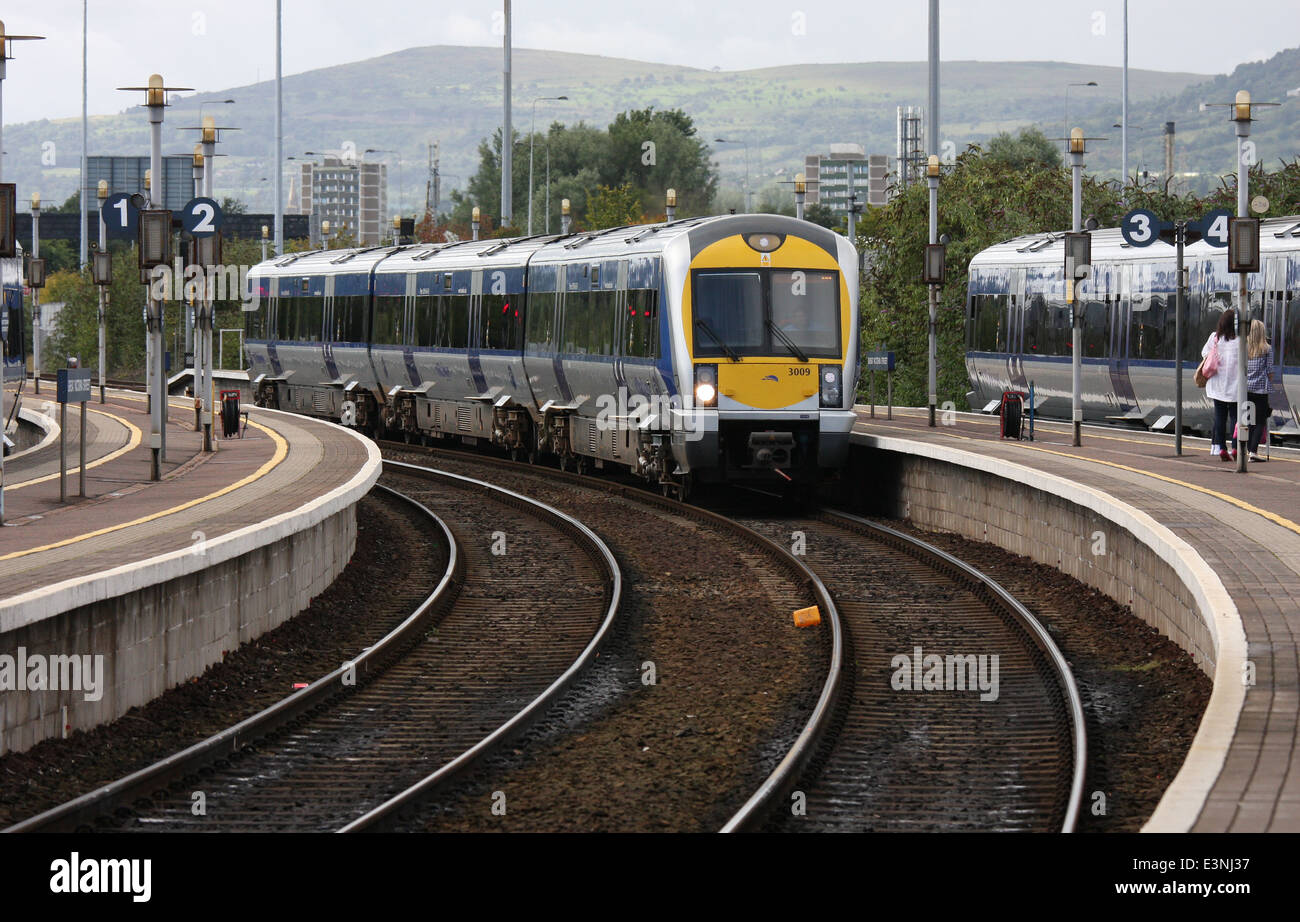 Train arriving at Great Victoria Street Station in Belfast Northern Ireland Stock Photo