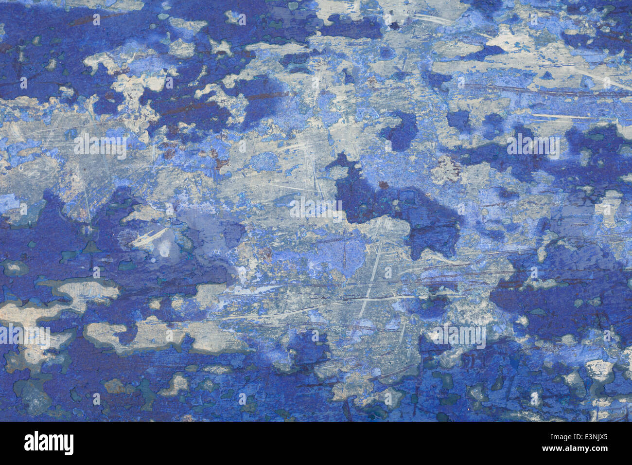 Chipped blue paint on upturned boat hull Stock Photo