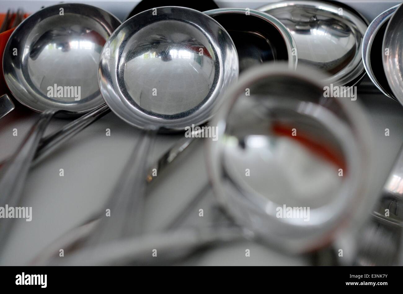 Soup ladles in a kitchen, Germany, 19. June 2014. Photo Frank May