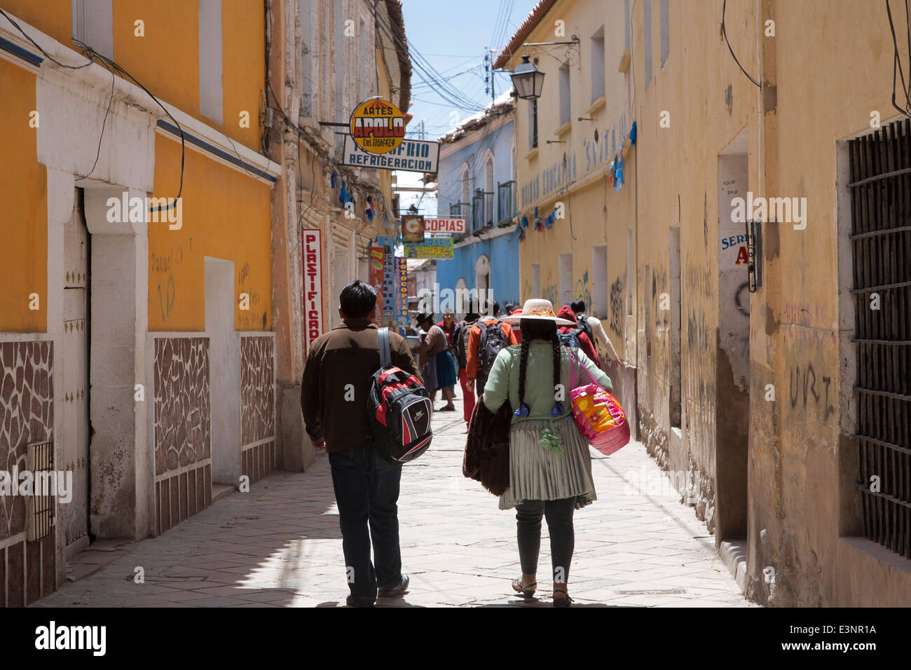Bolivian couple walking on the street. Potosi. Bolivia Stock Photo