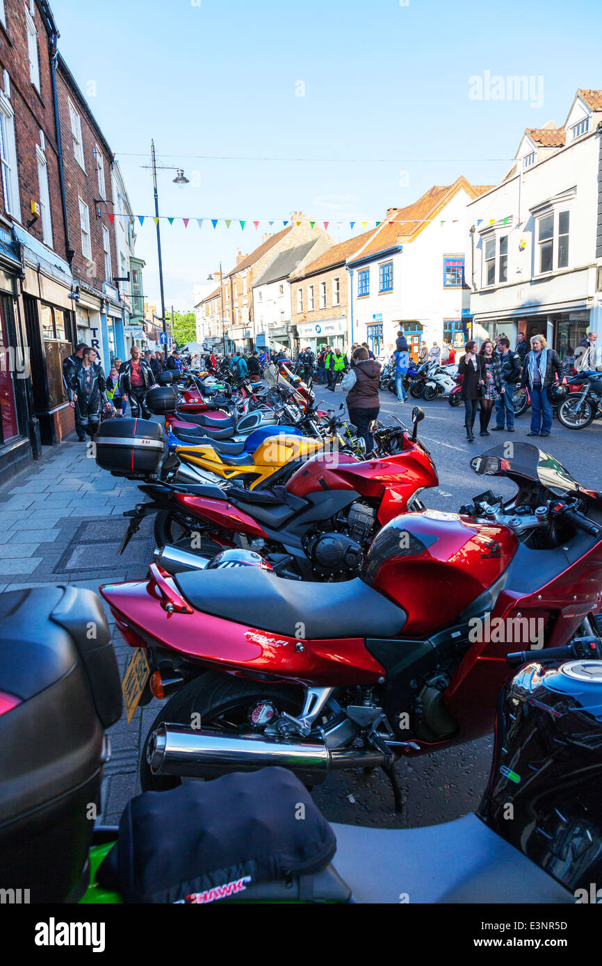 motorbikes parked through town on bike night nite Louth Lincolnshire UK Stock Photo