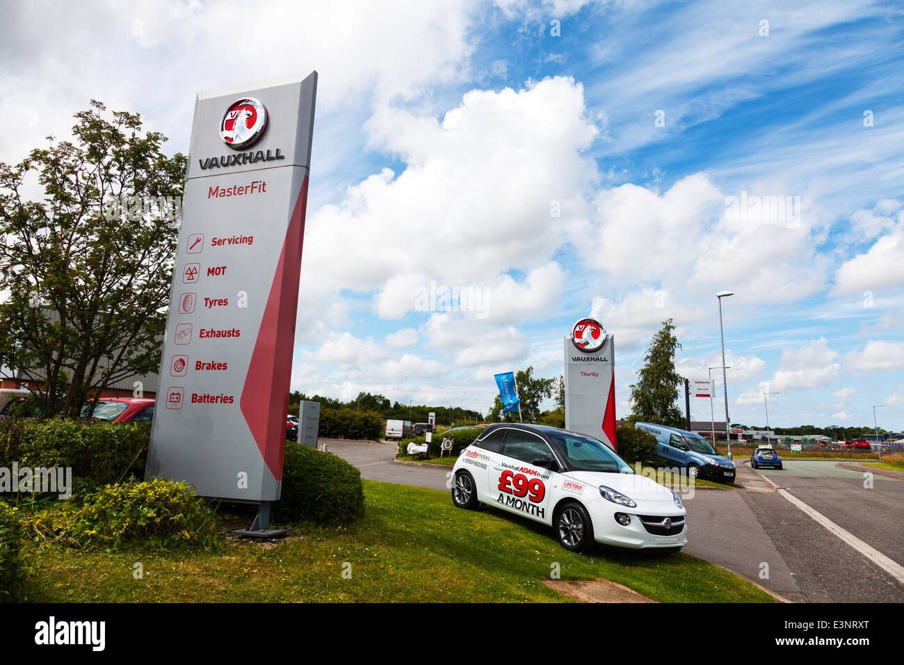 Vauxhall Thurlby motors car garage exterior sign selling sellers new used  vehicles Stock Photo