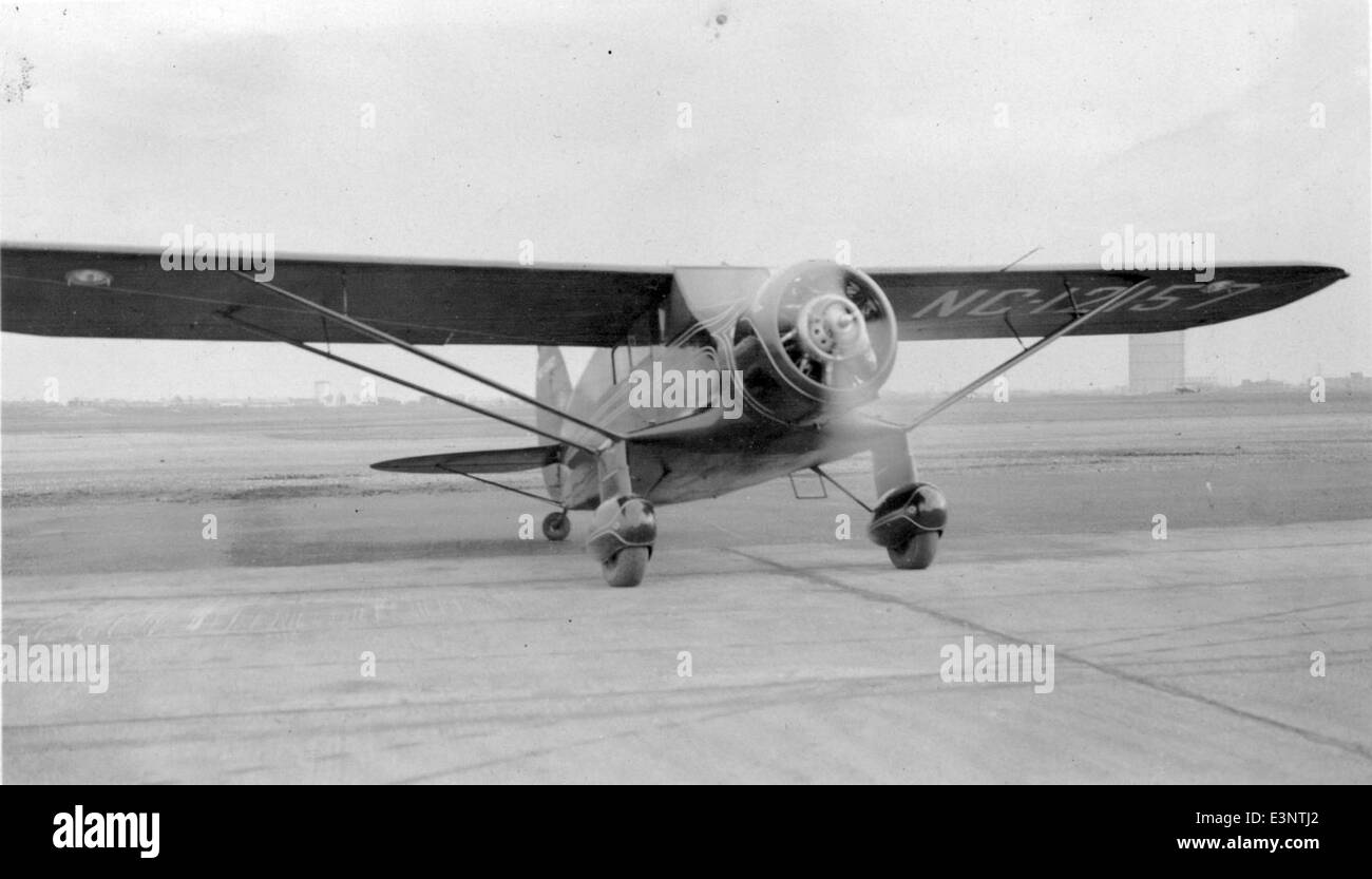 This image shows a Stinson R, registration NC12157, arriving at ...