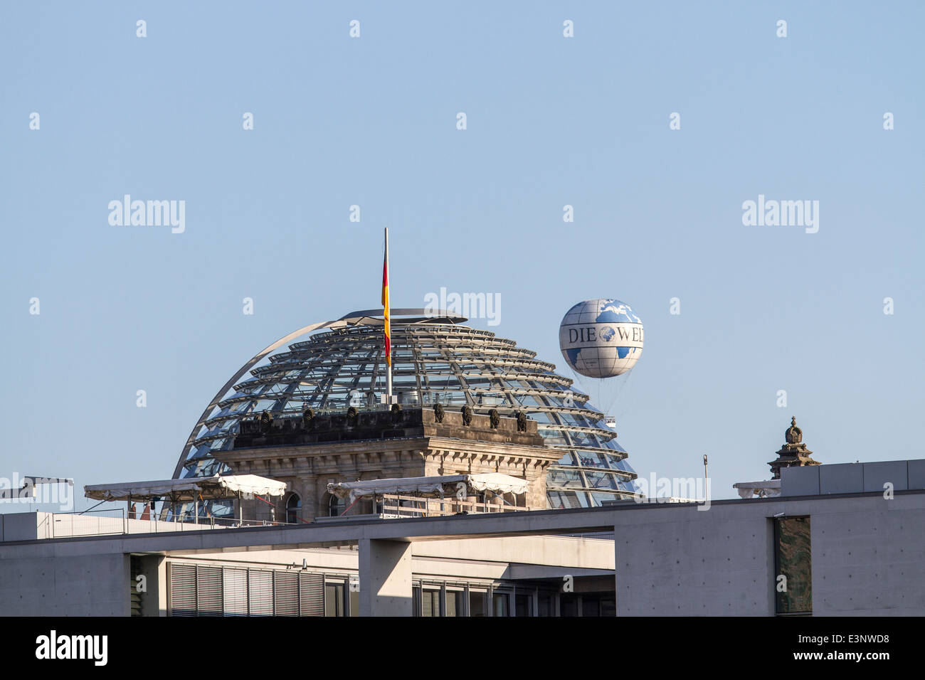 Captive balloon over Berlin Reichstag dome. Tele shot. Stock Photo