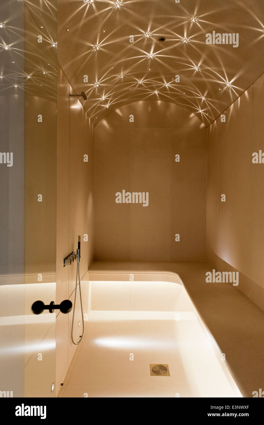 Starry lighting on arched ceiling of walk-in steam room Stock Photo