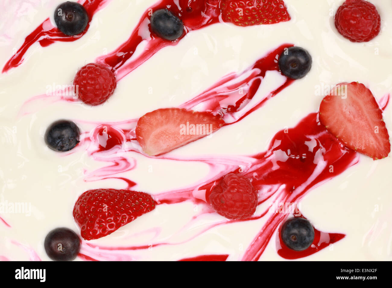 Fresh yogurt with fruits such as raspberries, strawberries and blueberries Stock Photo