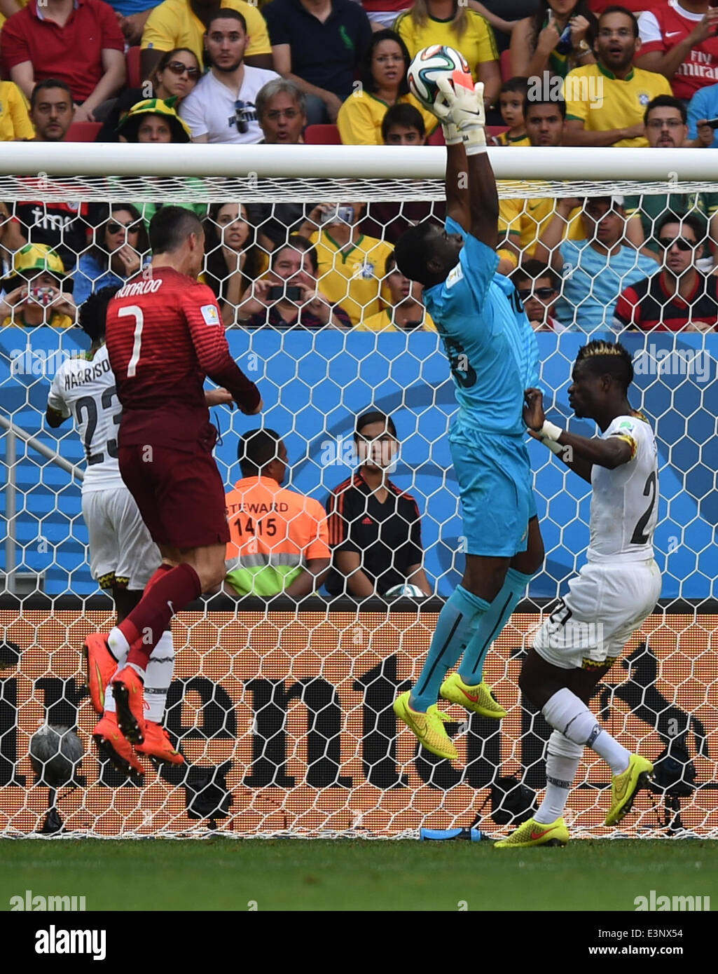 Brasilia, Brazil. 26th June, 2014. Harrison Afful (L-R), goalkeeper Fatawu Dauda, John Boye of Ghana in action against Cristiano Ronaldo (2-l) of Portugal during the FIFA World Cup 2014 group G preliminary round match between Portugal and Ghana at the Estadio National Stadium in Brasilia, Brazil, on 26 June 2014 Credit: © dpa picture alliance/Alamy Live News  Stock Photo