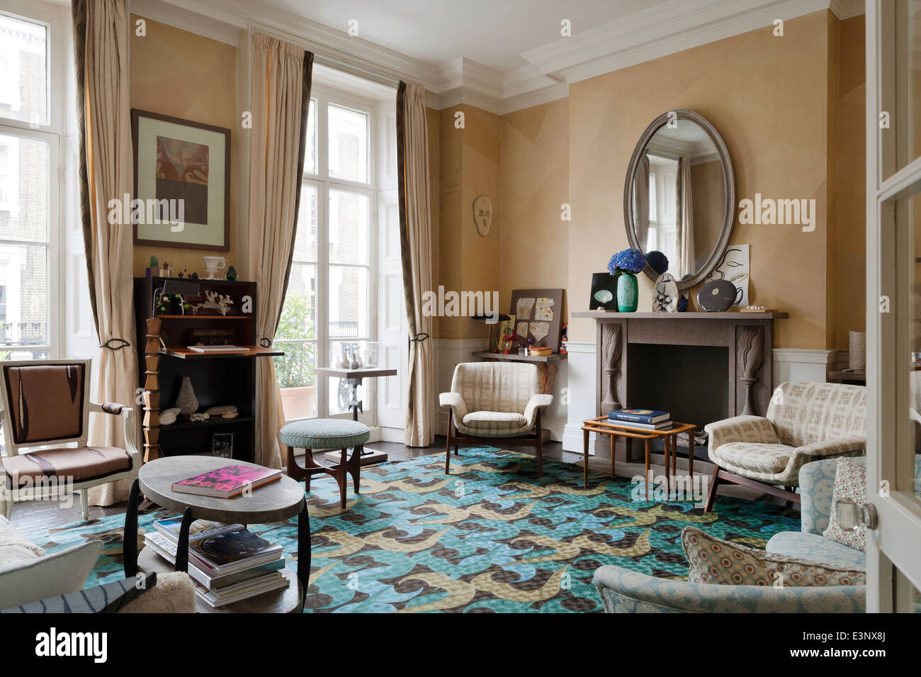 Bright rug designed by Allegra Hicks in drawing room with vintage