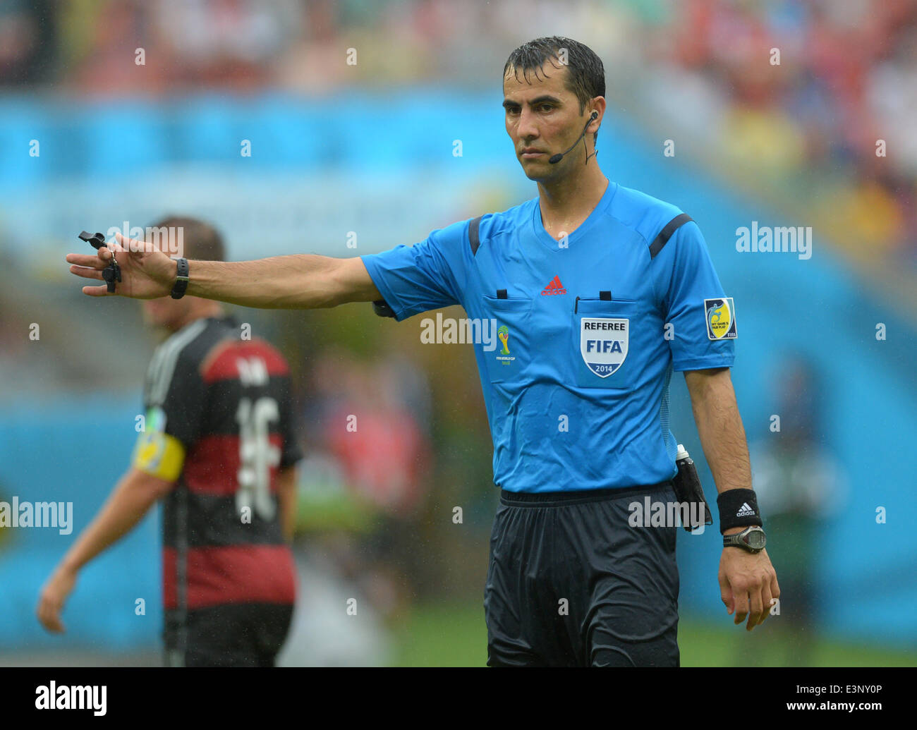 Recife, Brazil. 26th June, 2014. Referee Ravshan Irmatov of Uzbekistan gestures during the FIFA World Cup group G preliminary round match between the USA and Germany at Arena Pernambuco in Recife, Brazil, 26 June 2014. Photo: Thomas Eisenhuth/dpa/Alamy Live News Stock Photo