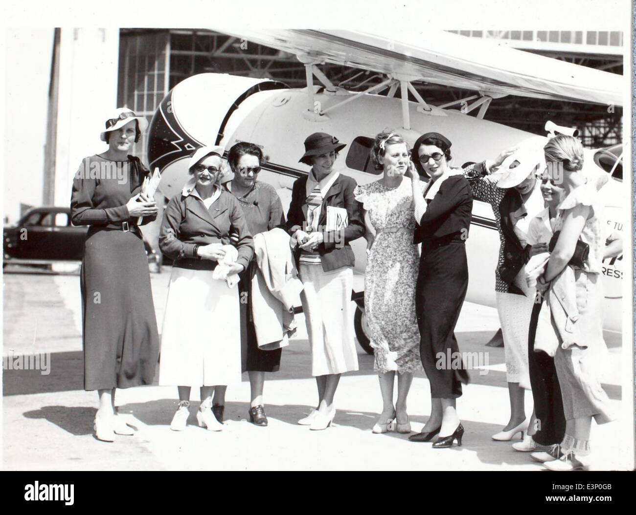 The image captures a classic aircraft from the Golden Age of Aviation ...