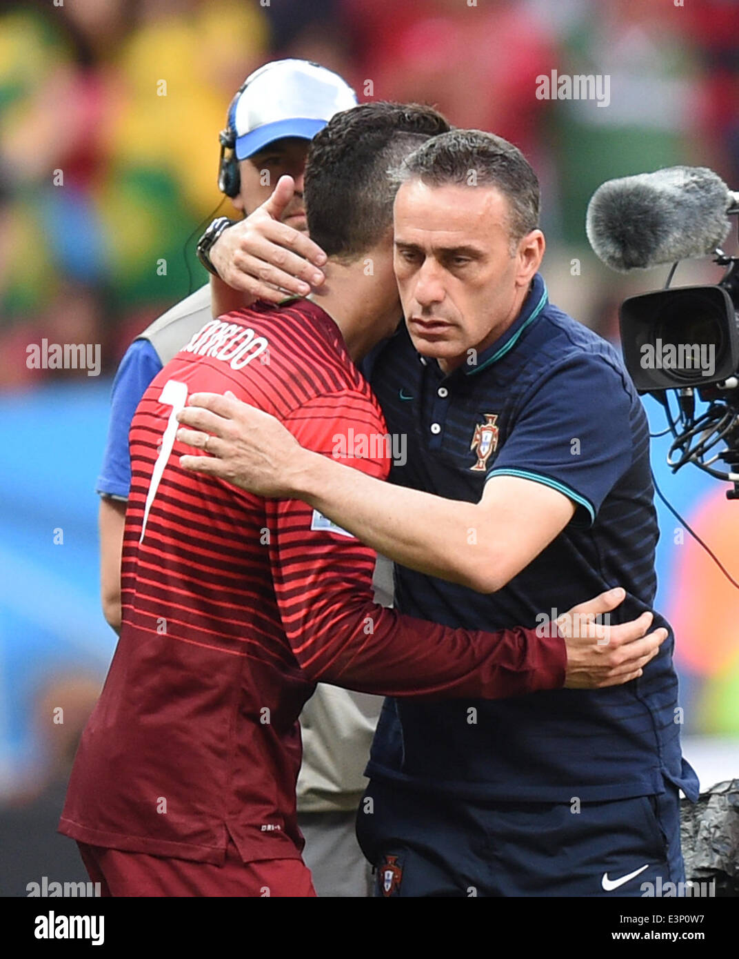 Brasilia, Brazil. 26th June, 2014. Cristiano Ronaldo (L) of Portugal hugs Portugal's head coach Paulo Bento after the FIFA World Cup 2014 group G preliminary round match between Portugal and Ghana at the Estadio National Stadium in Brasilia, Brazil, on 26 June 2014 Credit: © dpa picture alliance/Alamy Live News  Stock Photo