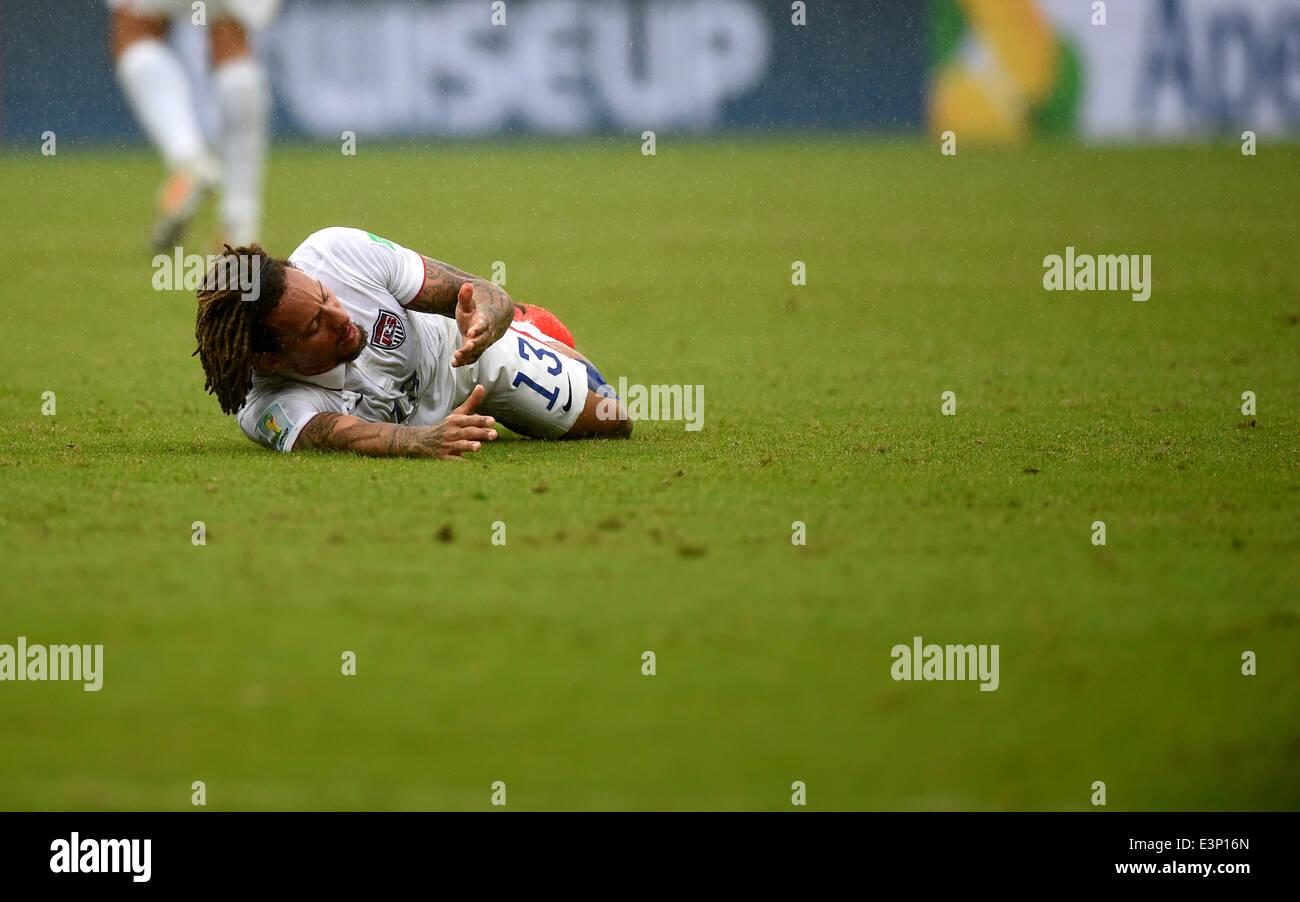 Recife, Brazil. 26th June, 2014. Jermaine Jones of the US lies on the pitch during the FIFA World Cup group G preliminary round match between the USA and Germany at Arena Pernambuco in Recife, Brazil, 26 June 2014. Photo: Marcus Brandt/dpa/Alamy Live News Stock Photo