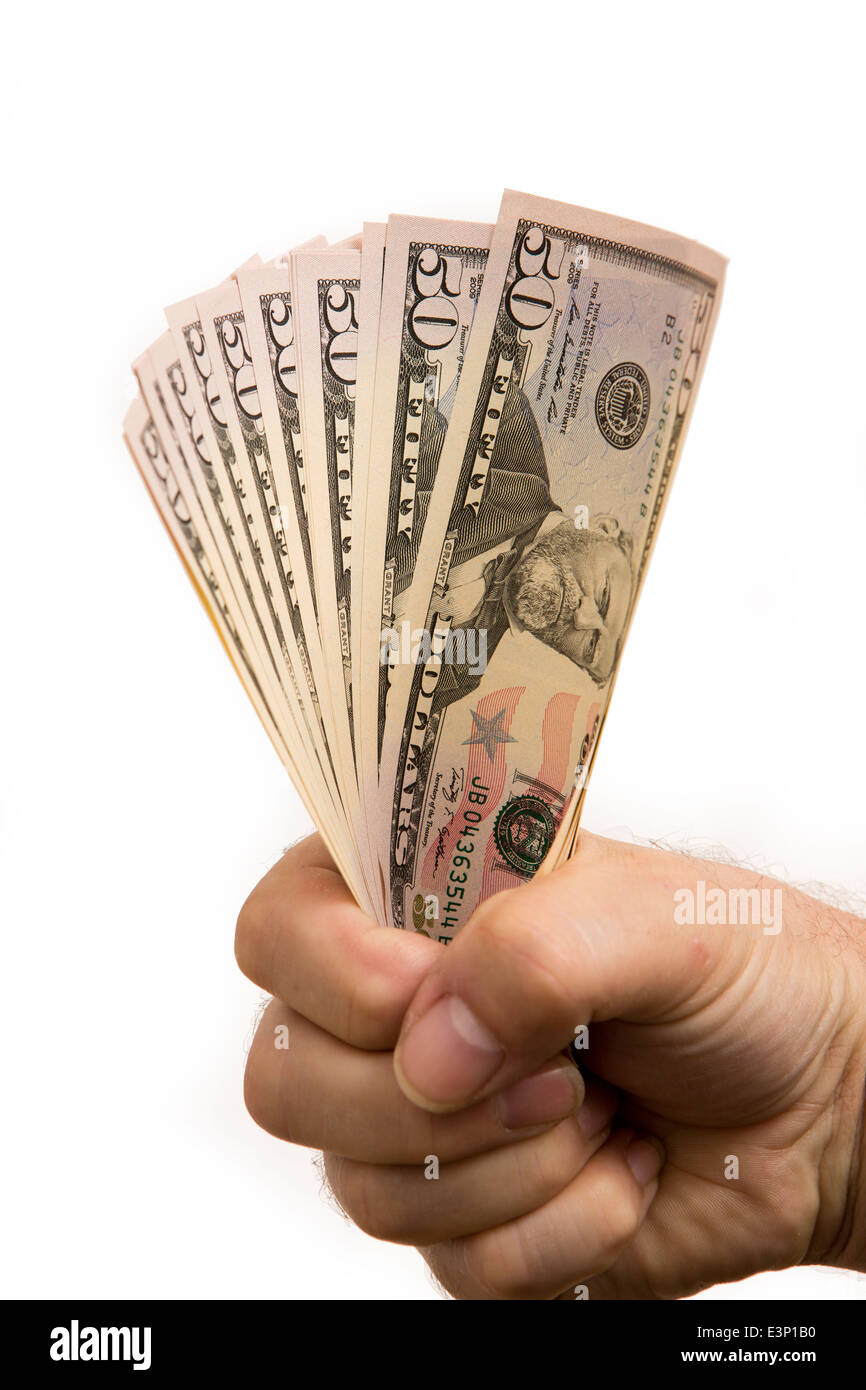 USA, Currency, man’s hand holding fist full of fifty dollar notes Stock Photo