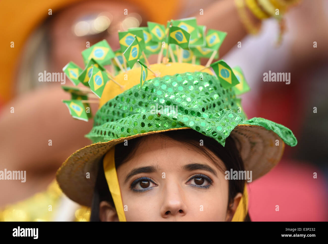 Brasilia, Brazil. 26th June, 2014. A supporter of Brazil is seen prior to the FIFA World Cup 2014 group G preliminary round match between Portugal and Ghana at the Estadio National Stadium in Brasilia, Brazil, on 26 June 2014 Credit: © dpa picture alliance/Alamy Live News  Stock Photo