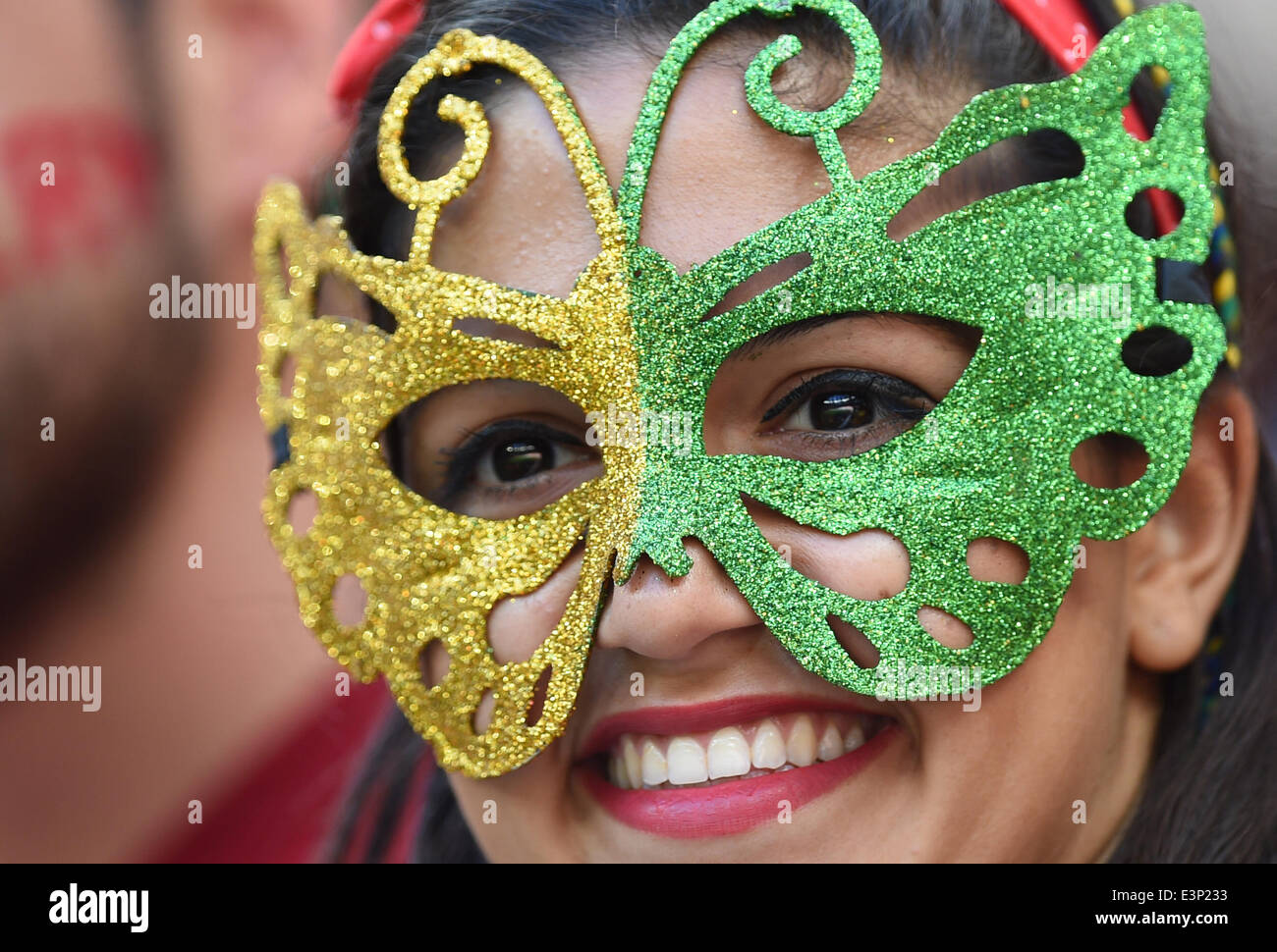 Brasilia, Brazil. 26th June, 2014. A supporter of Brazil is seen prior to the FIFA World Cup 2014 group G preliminary round match between Portugal and Ghana at the Estadio National Stadium in Brasilia, Brazil, on 26 June 2014 Credit: © dpa picture alliance/Alamy Live News  Stock Photo