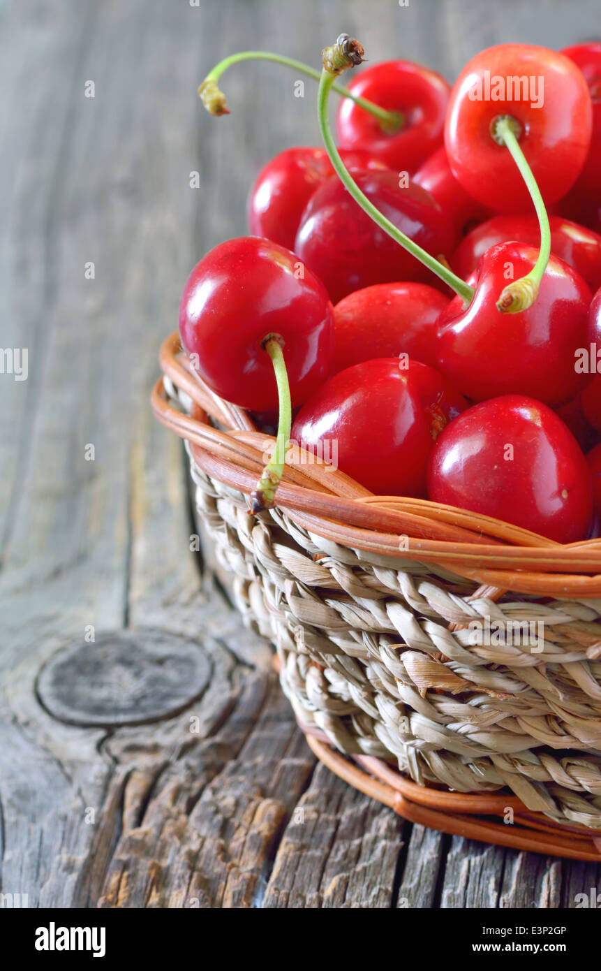 ripe cherries in a basket Stock Photo