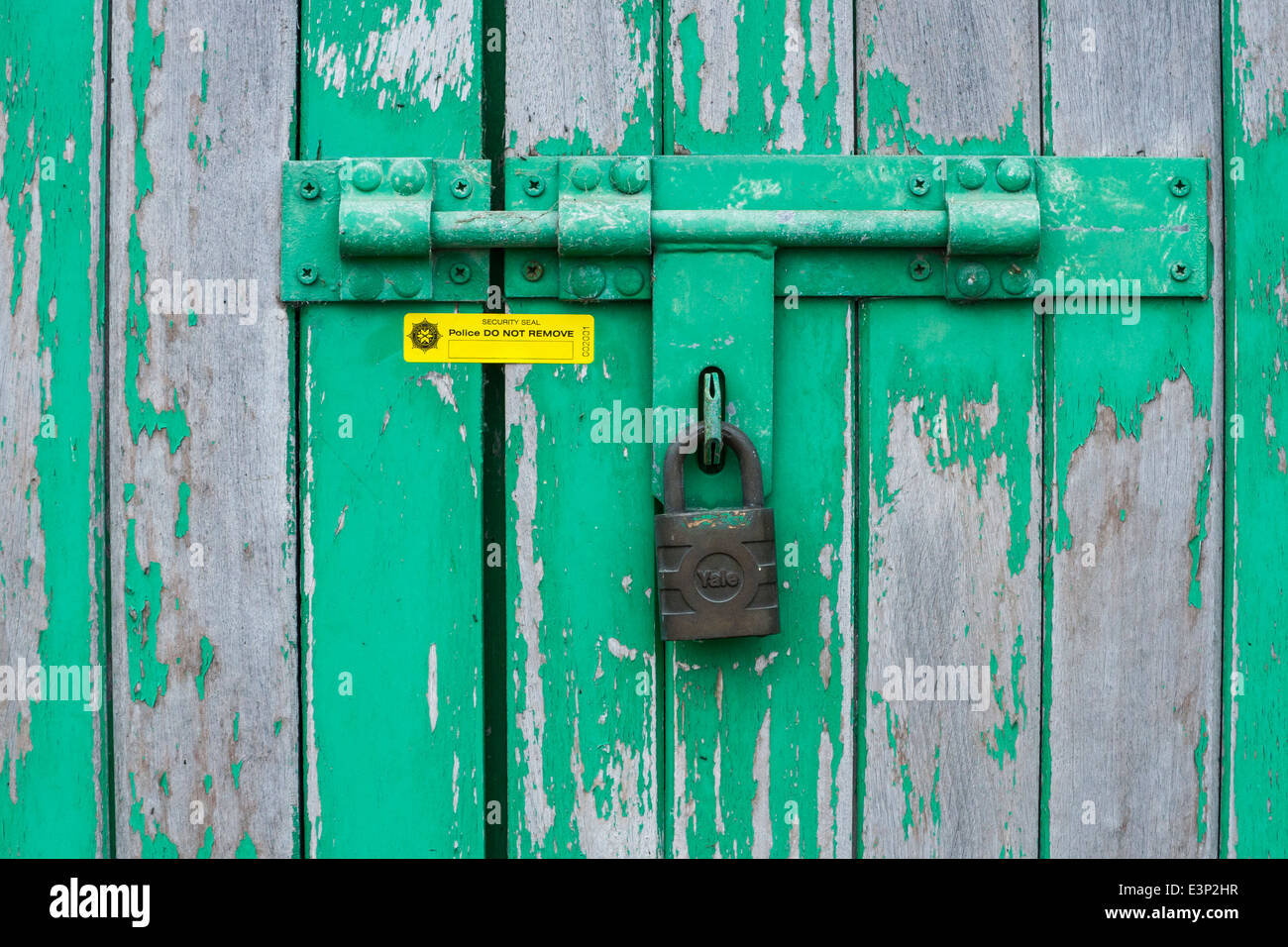 Bolt and lock on an old painted door Stock Photo Alamy