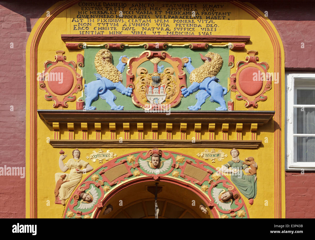 entrance portal of Alte Raths-Apotheke (old council pharmacy), Lueneburg, Lower-Saxony, Germany Stock Photo
