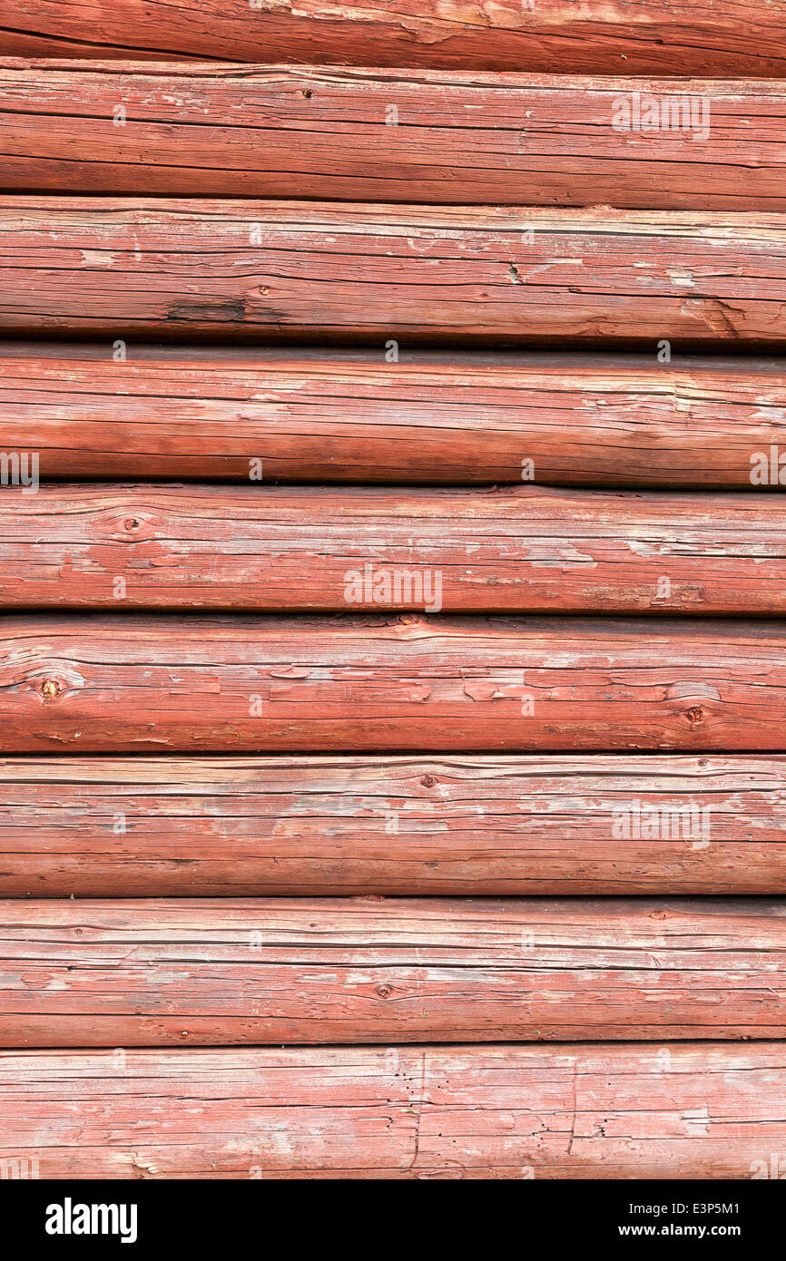Fragment of red wooden wall as background Stock Photo