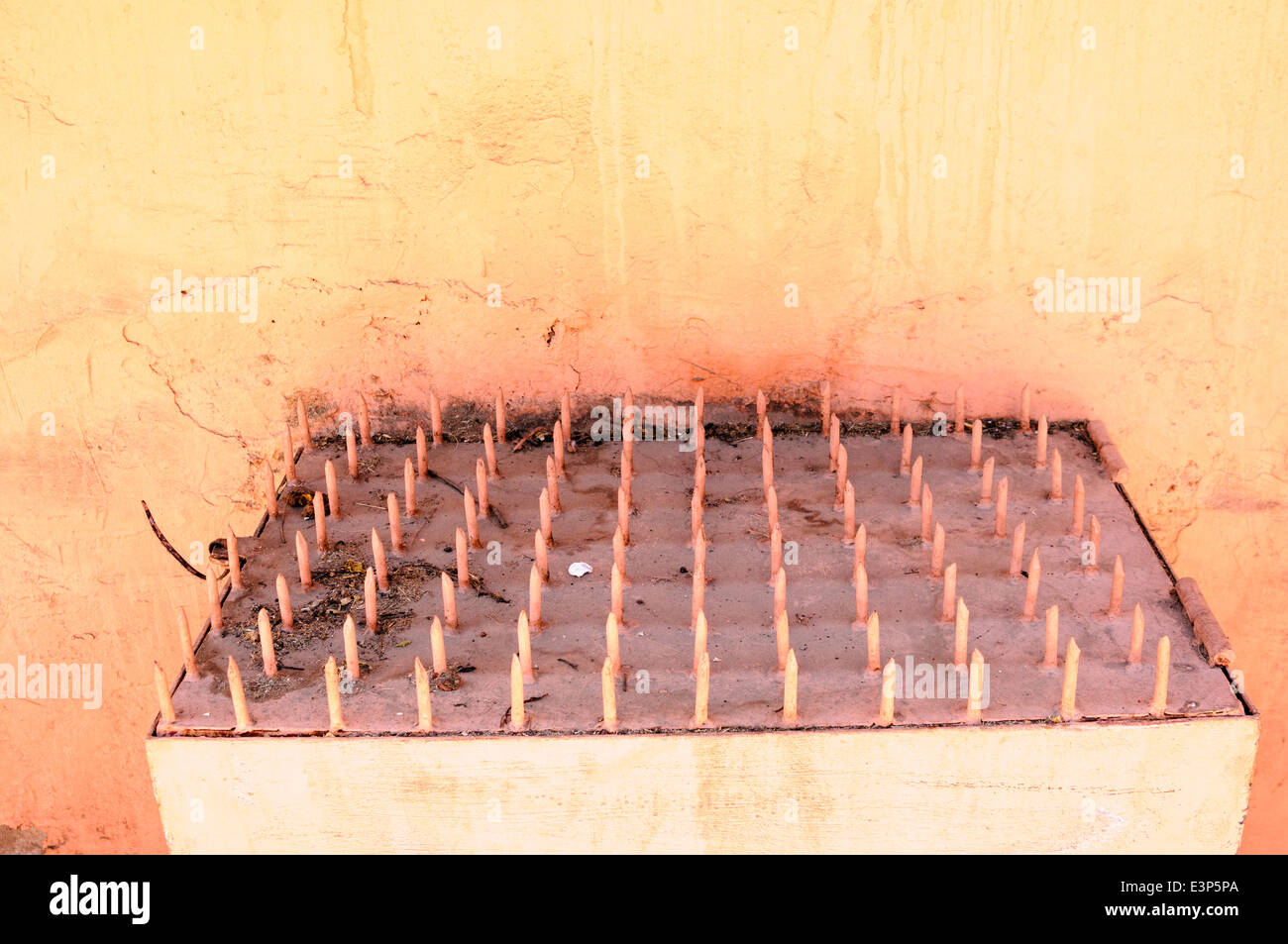 Spikes on a street cabinet to prevent homeless people sleeping or sitting on it, Marrakech, Morocco Stock Photo